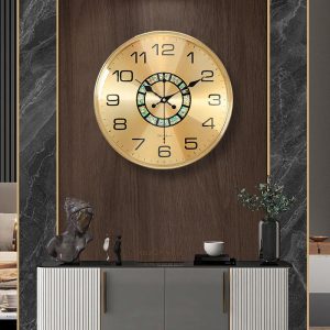 Brass wall clock with abalone shell inlay and gold finish
